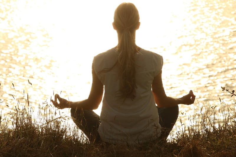 Woman practicing yoga and meditation